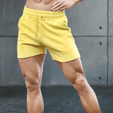 Shorts d'entrainement en coton extensibles de couleur unie pour hommes